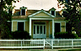 photograph of the Crockett home of the grandnephew of James Monroe, showing a picket fence and dormer windows
