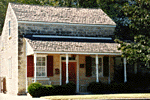 a photograph of a limestone house