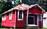 photograph of the Rosenwald School showing a red painted building