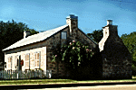 a photograph of the Peter Tatsch house, built of limestone blocks